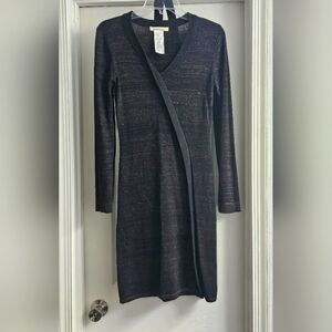 Black long sleeve above the knee sweater dress.